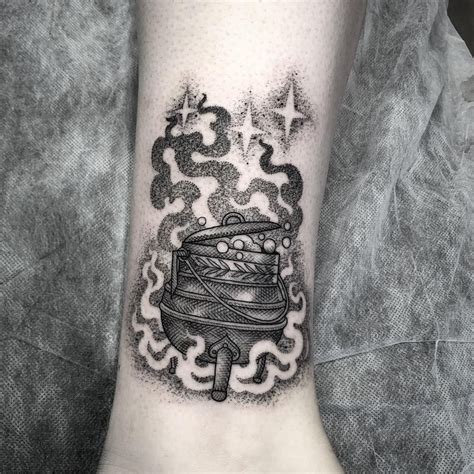 Channel your Inner Spellcaster: Witch Cauldron Tattoos for the Bold and Bewitching